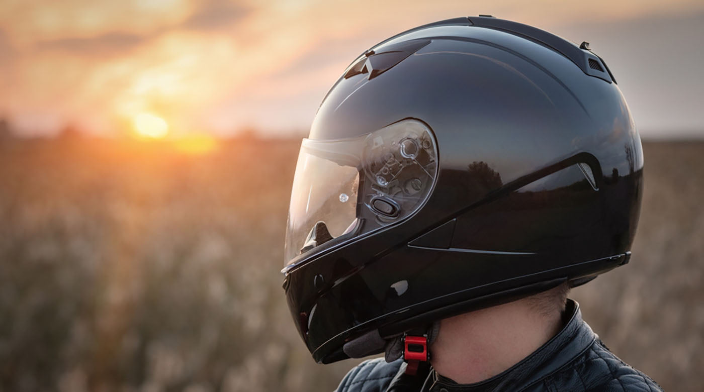 biker helmet sunset rays