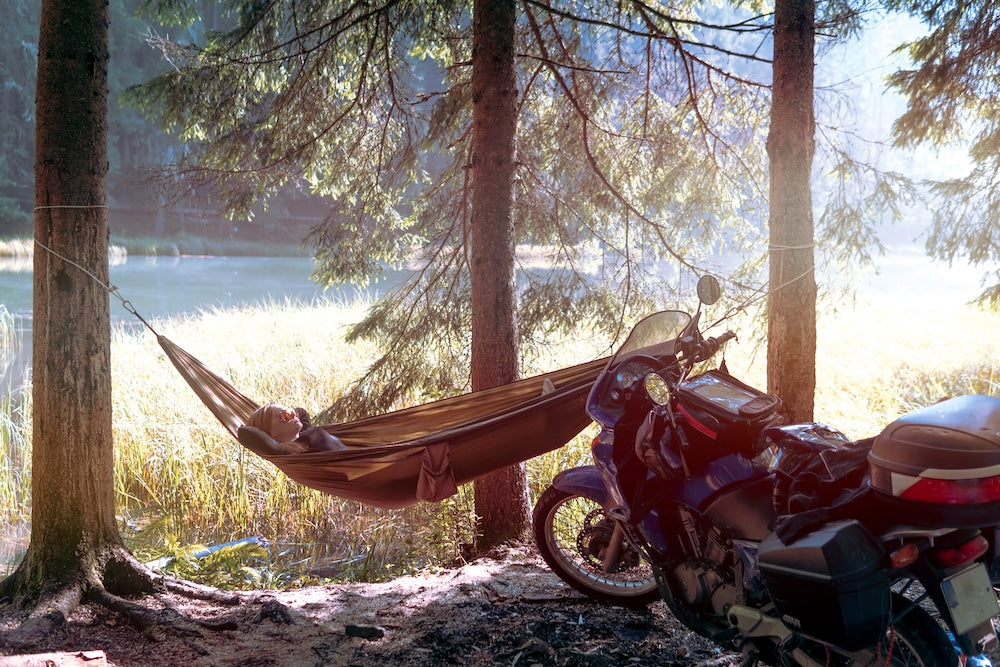 hammock and motorcycle at campsite