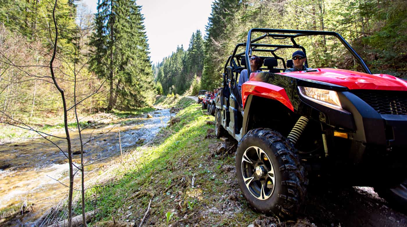 tour group travels on atvs utvs