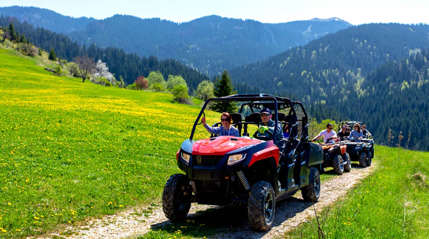 tour group travels on atvs and utvs